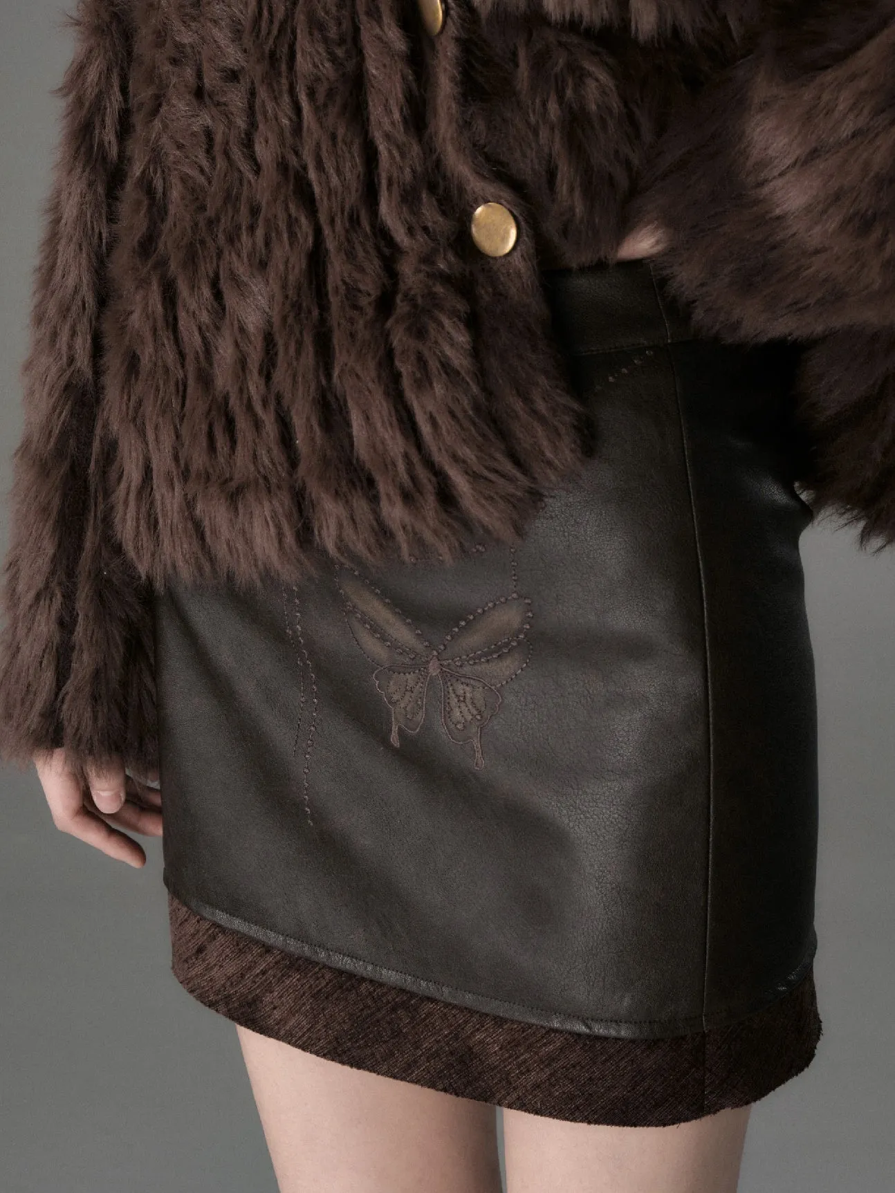 Chain Butterfly Raw Edge PU Leather Skirt